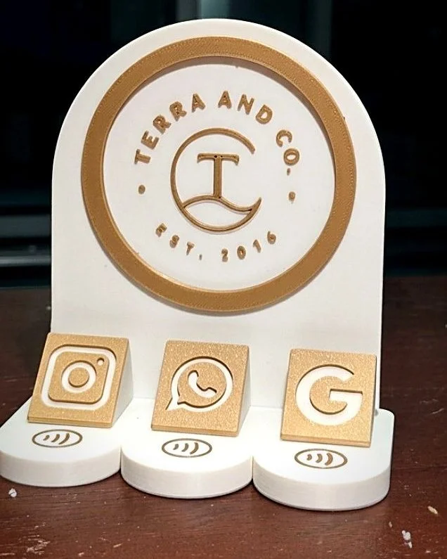 Terra and Co. NFC stand with Instagram, WhatsApp and Google tap tiles