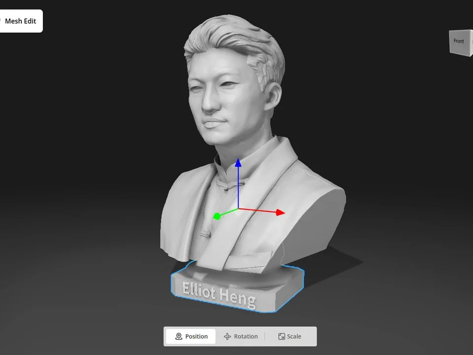 Generated 3D bust of a man in a mandarin-collar jacket in the editor, with Elliot Heng on the base